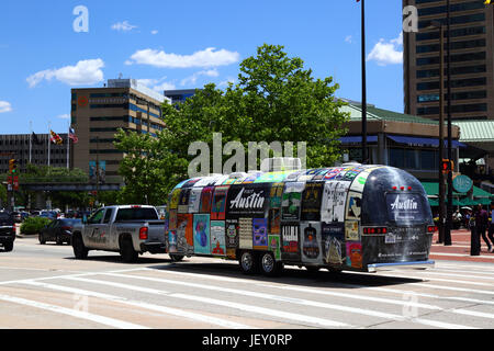 Pickup truck towing Airstream camper promoting Visit Austin tourism campaign, Inner Habor, Baltimore, Maryland, USA Stock Photo