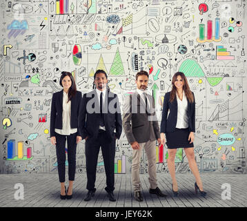 Group of successful men and women business people work on a creative project. Team and corporate concept Stock Photo