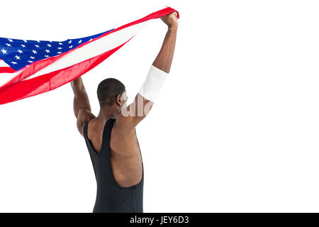 Athlete holding american flag Stock Photo