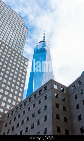 The Financial District, FiDi, in Lower Manhattan in New York City. We see the Freedom Tower, the tallest building in the Western Hemisphere Stock Photo