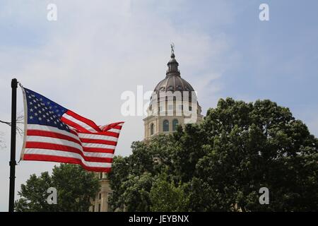 Kansas Capital Building with US Flag Stock Photo