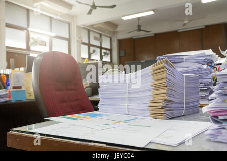 Pile of unfinished documents on office desk, Stack of business paper Stock Photo