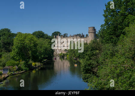 Warwick Castle & River Avon,Warwick Warwickshire,England.Warwick Castle is a medieval castle developed from an original built by William the Conqueror Stock Photo