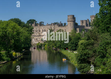 Warwick Castle & River Avon,Warwick Warwickshire,England.Warwick Castle is a medieval castle developed from an original built by William the Conqueror Stock Photo