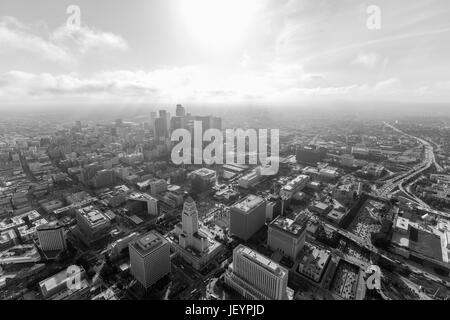 Aerial view of afternoon clouds over downtown Los Angeles in black and white. Stock Photo