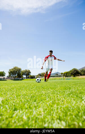 Football player practicing soccer Stock Photo