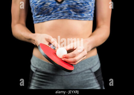 Female athlete playing table tennis Stock Photo