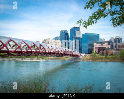 A view of the Peace Bridge (designed by Santiago Calatrava) and the skyline of Calgary, Alberta, Canada. Stock Photo