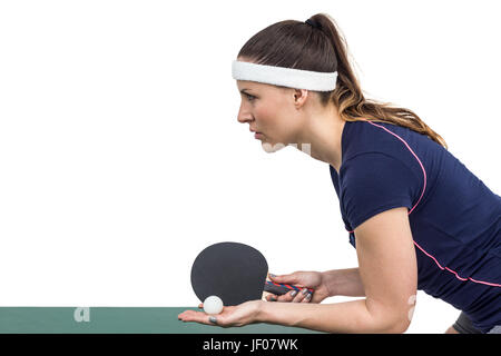 Female athlete playing table tennis Stock Photo