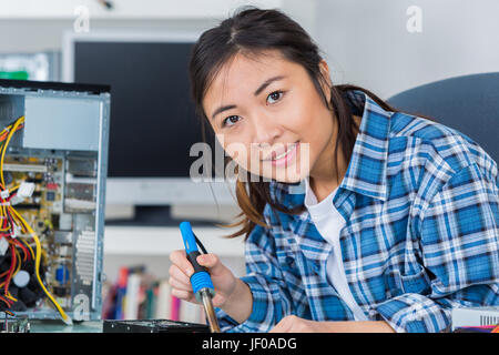 Oriental lady working on  computer Stock Photo