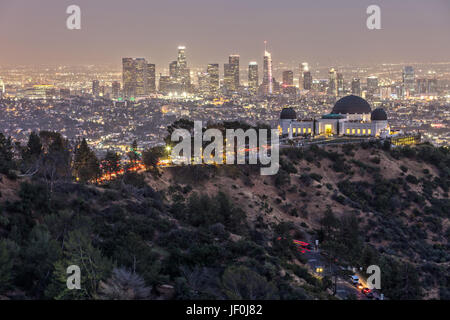 Griffith Observatory and the Skyline of Los Angeles at Night Stock Photo