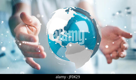 Businessman on blurred background using flying white and blue 3D rendering earth Stock Photo