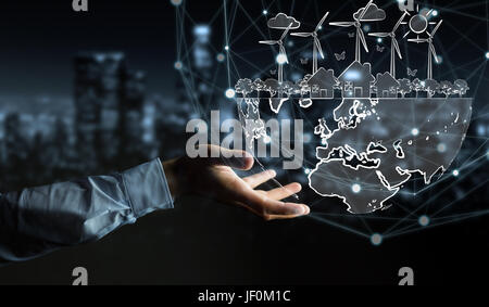 Businessman on blurred background hloding renewable energy sketch Stock Photo