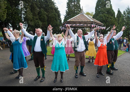 Shrewsbury Morris dancers performing in Castle Gardens as part of the St George's Day festivities in Bridgnorth, Shropshire. Stock Photo