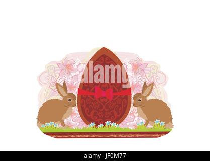 chocolate egg with red bow and two beautiful rabbits Stock Vector