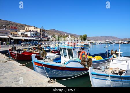 Traditional fishing boats in the harbour, Elounda, Crete, Greece, Europe. Stock Photo