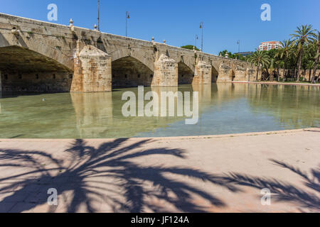 Historic Puente Del Mar bridge in a pond in Valencia, Spain Stock Photo