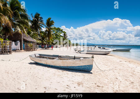 Ramena, Madagascar - December 20, 2015: Boats on the Ramena beach in the fishing village of Ramena, Madagascar, East African Islands, Africa. Stock Photo