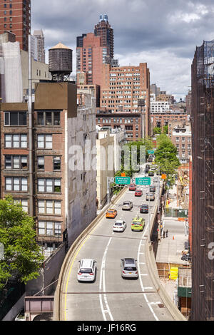 New York, USA - May 26, 2017: Cars leave Ed Koch Queensboro Bridge entering Manhattan. Bridge connects Long Island City with Manhattan. Stock Photo