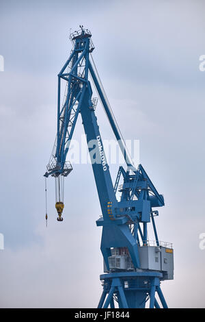 AARHUS, DENMARK - JUNE 05, 2016: Close up of a blue gantry crane on the harbor of Aarhus Stock Photo