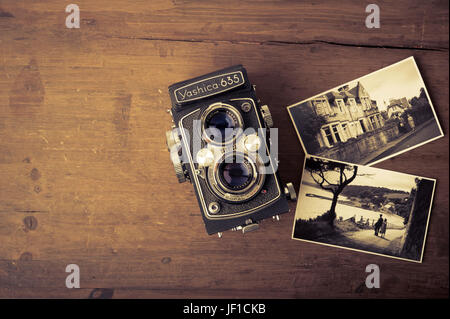 classic Yashica photo camera and vintage photographs Stock Photo