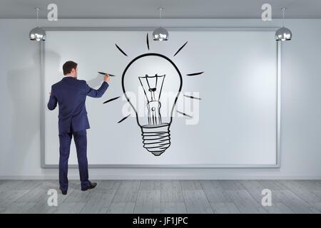 Businessman in modern interior drawing a lightbulb on a board 3D rendering