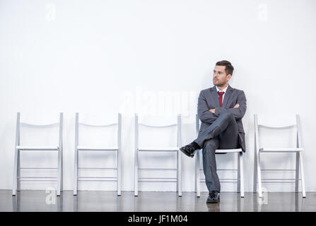 businessman sitting and waiting for interview in office, business concept Stock Photo