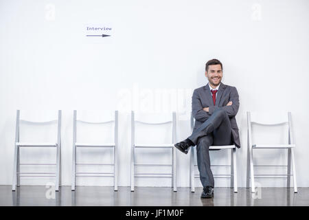 businessman sitting and waiting for interview in office, business concept Stock Photo