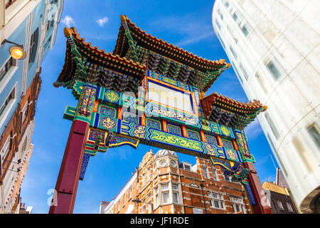 Colourful oriental style gate into Chinatown, London, UK Stock Photo