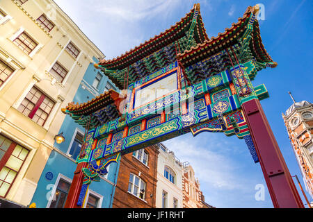 Colourful oriental style gate into Chinatown, London, UK Stock Photo