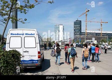 Tourists at the East Side Gallery in Berlin Stock Photo