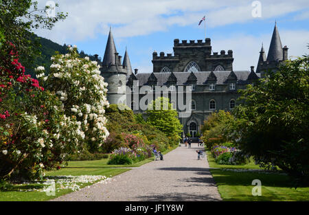 Tourists Outside Inveraray Castle which is the home of the Duke and Duchess of Argyll, West Scotland, UK. Stock Photo