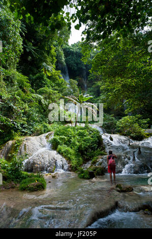 Woman looking at the beautiful Mele-Maat cascades in Port Vila, Island of Efate, Vanuatu, South Pacific, MR Stock Photo