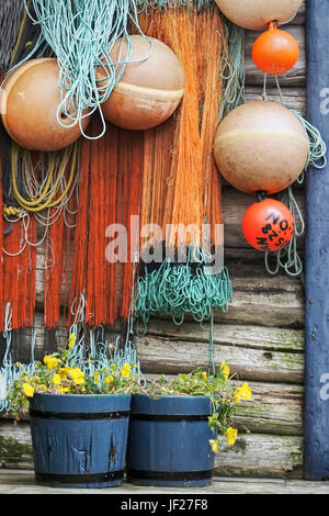 Buoys hanging on wooden wall Stock Photo