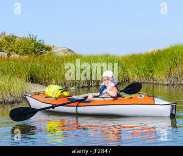 Boy kayaking Stock Photo