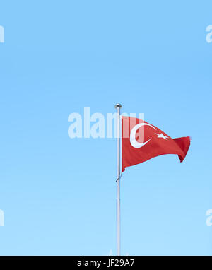 Turkish flag against sky background Stock Photo