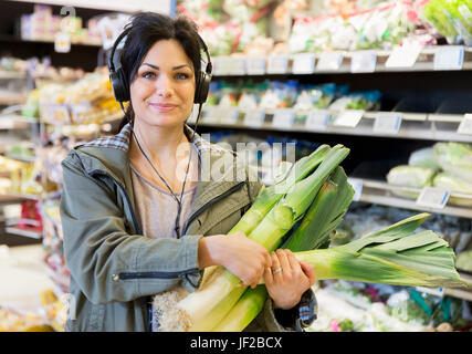 Smiling woman doing shopping Stock Photo