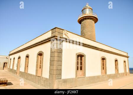 Old Lighthouse near the Sea Stock Photo