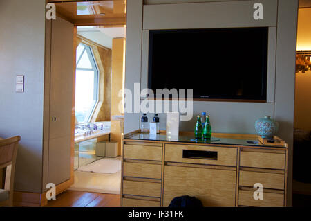 SINGAPORE - JULY 23rd, 2016: luxury Hotel room with modern interior, a comfortable bed and an awesome view of the Marina Bay, LCD TV Stock Photo