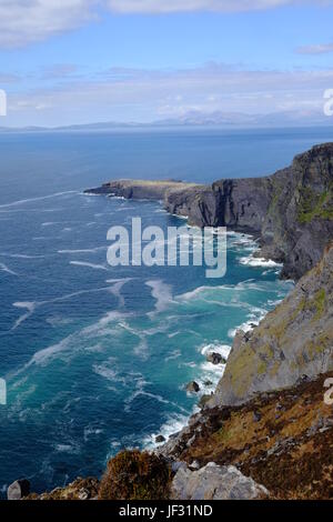 View from Geokaun Mountain over Fogher Cliffs, Valentia Island, County Kerry, Ireland. The highest point on Valentia Island. View towards Dingle. Stock Photo
