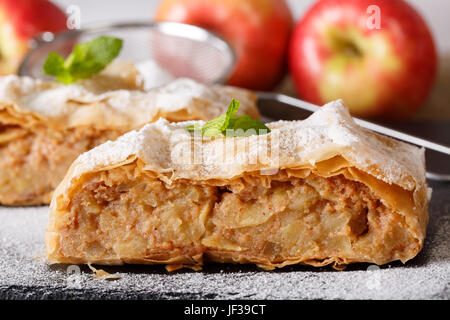 Traditional Austrian apple strudel close-up on the board. horizontal Stock Photo