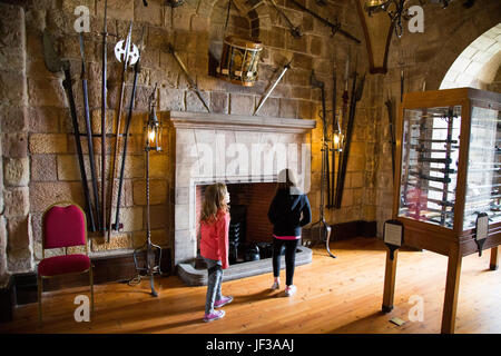 The Armoury at Bamburgh Castle, Northumberland, England, UK Stock Photo