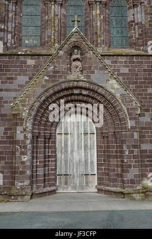 Doorway beneath Roman arch, St David's, or St Davids, cathedral, Pembrokeshire, West Wales. Stock Photo