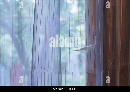 Transparent curtain on window Stock Photo