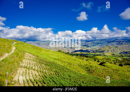 Beautiful landscape of the mountains near of Quilotoa volcano with some agriculture lands. Quilotoa is the western volcano in Andes range and is locat Stock Photo