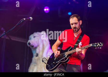 Dundrennan Scotland, UK - July 26, 2014: Martin Noble of British Sea Power performs the Wickerman Festival Stock Photo