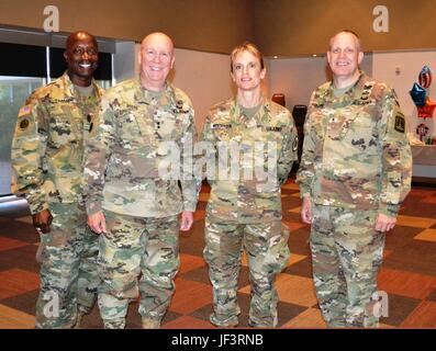 Command Sgt. Maj. Ronnie Farmer, 335th Signal Command (Theater) command sergeant major, Maj. Gen. Peter Bosse, 335th SC (T) commanding general, Col. Jean Henderson, 505th Theater Tactical Signal Brigade commander, and Brig. Gen. John Phillips, 335th SC (T) deputy commanding general-operations, traveled to Mesa, Arizona, at the Silvestre Herrera U.S. Army Reserve Center May 20, where they were briefed by Col. Henderson and her staff at their Yearly Training Brief. Stock Photo