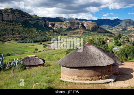 Landscape Hlotse River Valley with thatched rondavel houses Leribe District Lesotho Southern Africa Stock Photo