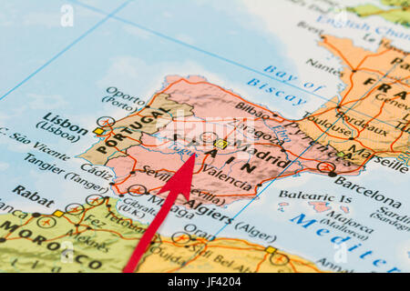 Photo of Spain. Country indicated by red arrow. Country on European continent. Stock Photo