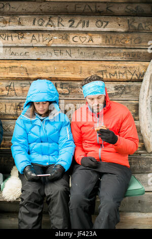 Young couple using cell phones Stock Photo